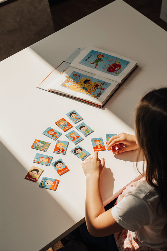 Child learning Chinese using Bestling flashcards and storybook
